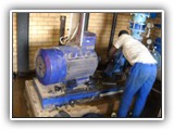 Our Fitter working on a clients machine on their Site